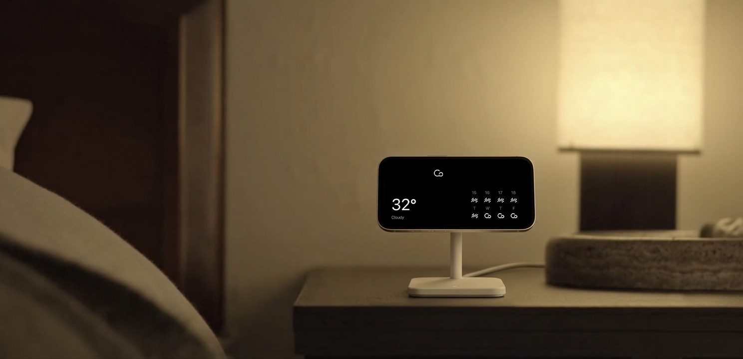 A lamp glowing in a bedroom at night